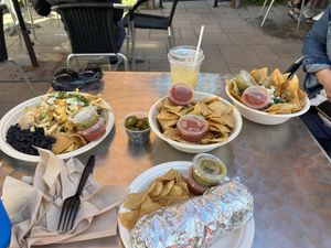 Taco combo / vegan burrito / guac and chips / vegan reggae bowl  at Rasta Taco in Laguna Beach