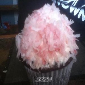 snowball cupcake
chocolate cake filled with ricemellow cream with chunky strawberry frosting and strawberry coconut at O! Vegasm in New Orleans