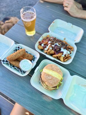 The Newport Nightmare Burger, the Gorillafry and Buddy’s Stix— all delicious! 😋   at Gnarlys - Swan Dive in Portland