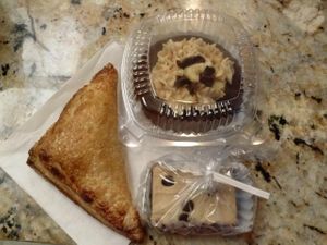 apple turnover, peanut butter banana cupcake and peanut butter chocolate bar at No Udder Desserts in Woodland Hills