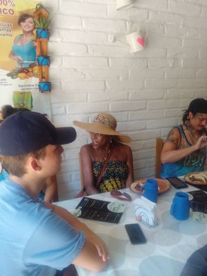 My friend in hat eats fish but I'm working on veganizing her.lol at 100% Vegana Taqueria in Puerto Vallarta