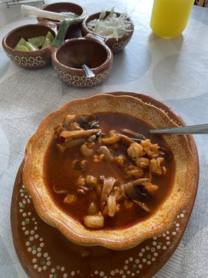 Sides for the tacos, posole, agua Fresca de piña   at 100% Vegana Taqueria in Puerto Vallarta