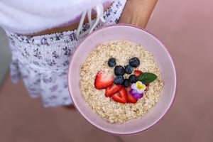 Cold overnight oats made with house-made almond milk and topped with organic berries at Elixir De La Lune in La Jolla