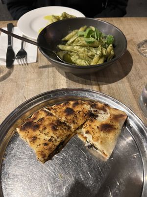 Eggplant calzone and penne pesto pasta  at The Rustic Olive in Redcliffe