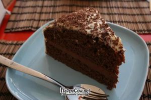 Chocolate cake with ganache filling and white choc frosting, wow... at Bake the Difference in Lisbon