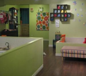 The sofa/ book reading areas for the bigger kids or mother with smaller baby. at La Tasse Gamine in Montreal