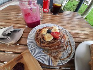 Vegan pancakes with peanut cream and banana at ECO DEL MAR in Blanes