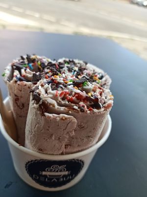 Hazelnut and cherry ice cream with Chocolate and Strawberry Sauce + Sprinkles at Delabuu Ice Cream in Berlin