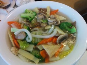 Fuji Udon, udon noodles, soy protein, Chinese Napa, carrots, mushrooms, green onions, broccoli, homemade vegetable broth. Delicious, rich broth made the dish! at Walk the Wok in Portland