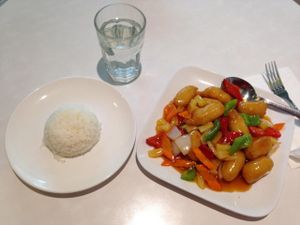 A typical Chinese dish with apple pie, carrot, onion, sweet pepper, and coated and fried soya meat, all in a tasty sweet and sour sauce. at Walk the Wok in Portland