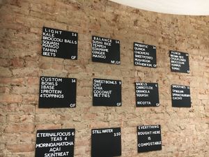 Wall menu; note the reasonable prices and note that all is compostable at Scen Studio in New York City