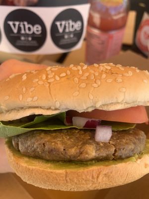 Nut burger sub avocado for the vegan mayo and added tomato and red onion…very good! 👍  at Vibe Health Bar in Folsom