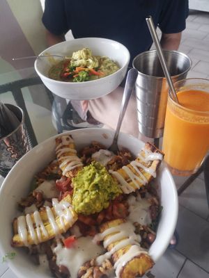Bowl tico in the front and the zucchini past curry at Varuna Plant-Based Food & Juice Bar in Manuel Antonio