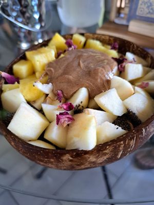Green smoothie bowls with avocado, kale, and spiraling, chia seefs, apple, pineapple and almond butter. at Varuna Plant-Based Food & Juice Bar in Manuel Antonio