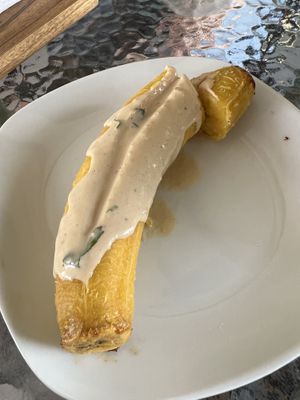 Plantain with tahini, not cooked, would not recommend   at Varuna Plant-Based Food & Juice Bar in Manuel Antonio