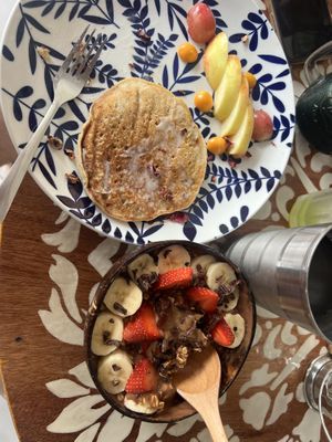 Banana pancakes and cocoa smoothie bowl - yum!   at Varuna Plant-Based Food & Juice Bar in Manuel Antonio