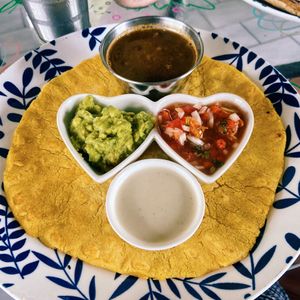 Breakfast tortilla (with beans, guacamole, pico de gallo and cheese sauce)  at Varuna Plant-Based Food & Juice Bar in Manuel Antonio