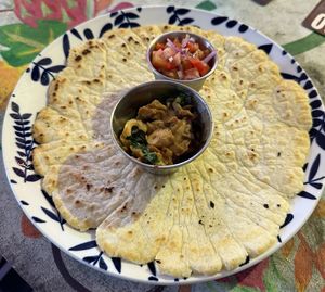 Tortilla with mushrooms. Thats what you get when you order without extras. The tortilla is super thick, brittle and tasteless. Wouldn‘t recommend this dish.  at Varuna Plant-Based Food & Juice Bar in Manuel Antonio