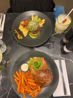 Beetroot burger encased in avocado with tortillas and quinoa burger with avocado and sweet potato fries. All utterly lush and vegan 🥑   at The Avocado Show in London