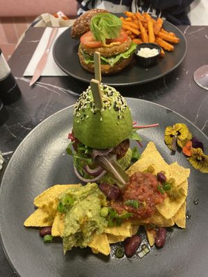 Front pic is beetroot burger with whole avocado and tortillas  at The Avocado Show in London