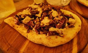 Main course: Pinsa you and me tonno e radicchio (Pinsa you and me tuna and radicchio) at Raparossa  in Pezze Di Greco