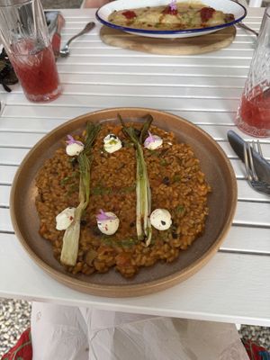 Rice dish and a mushroom cannelloni in background  at Bellaverde in Mallorca
