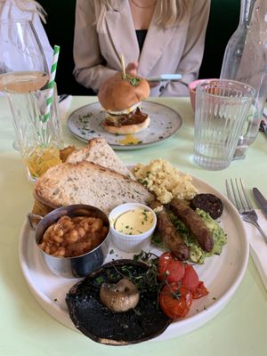 Plant full english: toast, scrambled tofu, avo, mushroom, vegan black pudding, vegan sausage, potato rosti, baked beans and vine tomatoes at Oeuf in Hove