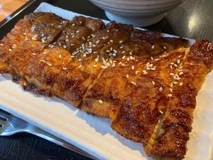 Choose your protein. The vegan/vegetarian option is tofu skin with your choice of sauce. This is with teriyaki sauce. Delicious!  at Protein Kitchen  in Taipei