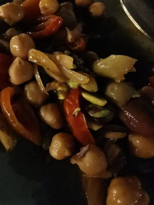 Chickpeas with tomatoes olives onion at Lucciola Organic Bistro in Corfu