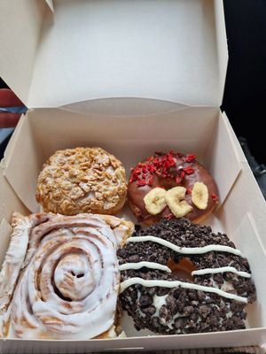 Busy Bee, Milk Chocolate, Zebra and Cinnamon Roll at Jones Donuts in Stuttgart