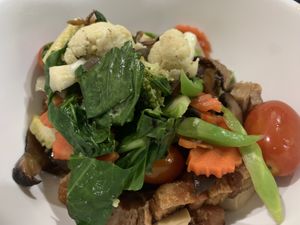 Stir fried mixed vegetables with crispy pork    at VEGAN PHUKET in Phuket