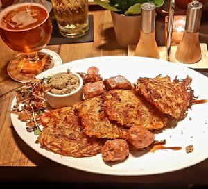 Beyond meat sausage with potato pancakes at Garage in Riga