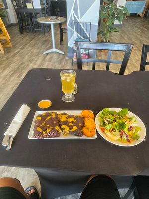 Delicious plant based fibs plantains and fresh salad at Vegan Monarch Bakery & Café in Winter Haven