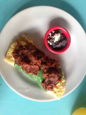 Omelette with salsa. at Pan Comido - Roma Norte in Mexico City