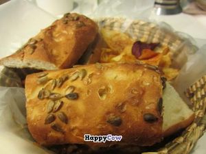 Ganesh sandwich of curried vegetables and tofu.  This one is vegan; also comes in a vegetarian version with yogurt sauce.  Served with homemade chips. at Pan Comido - Roma Norte in Mexico City