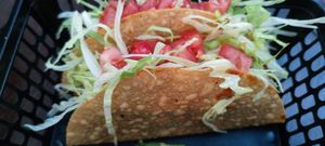 Small tacos in fried corn shells. at Atacolypse in Leipzig