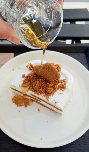 pouring syrup over frozen cookie-cake at Coffee Doga Heritage - Itaewon branch 커피도가 헤리티지 이태원점 in Seoul