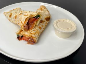 batinjan saj + tahini sauce (plated at home) at Yalla in Seattle