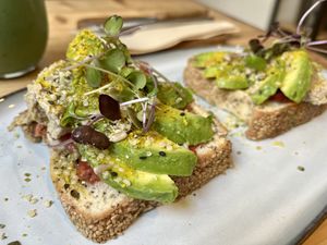 Avocado, tomato, micro greens, seeds, vegan home made parmesan, home made vegan cheese  at Nu Market & Coffee in Mallorca