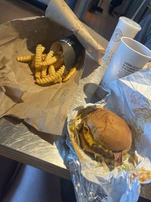 Fries and One Night Stand Burger  at Slutty Vegan in Duluth