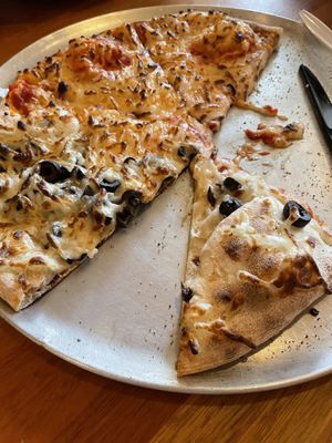 Vegan cheese, half tomato sauce half no sauce   at Wood Fired Pizza in Thomas