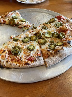 Vegan cheese and jalapeños   at Wood Fired Pizza in Thomas