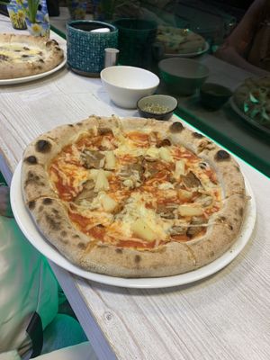 Hawaii and white pie pizzas  at Pizza Cosi in Budapest