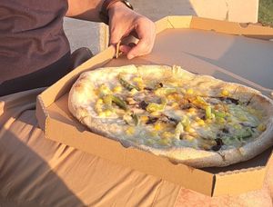 Pizza with sour cream, bell pepper, sweet corn and onion at Pizza Cosi in Budapest