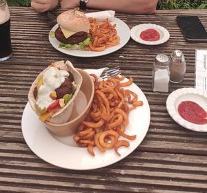 Roasted veg/meatball kebab and curly fries. Double stacker burger and curly fries. at The Globe in Glossop