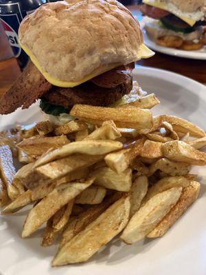 Stacker burger with homemade fries  at The Globe in Glossop