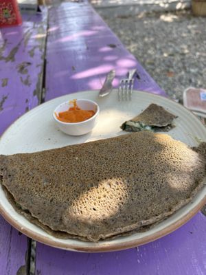 Gluten free buckwheat crepe with creamy spinach filling  at Secret Garden Cafe in Rishikesh