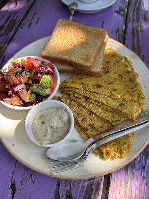 Breakfast combo with chilla, toast, salad and cashew cream.   at Secret Garden Cafe in Rishikesh