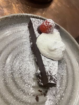 Raspberry and chocolate tort with cream    at Olive Tree Brasserie in Stockton Heath