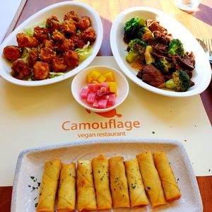 orange chickn beeef broccoli and vege spring rolls at Camouflage in Seoul